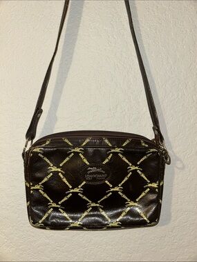 Longchamp Black Leather Crossbody with Gold Chain Motif